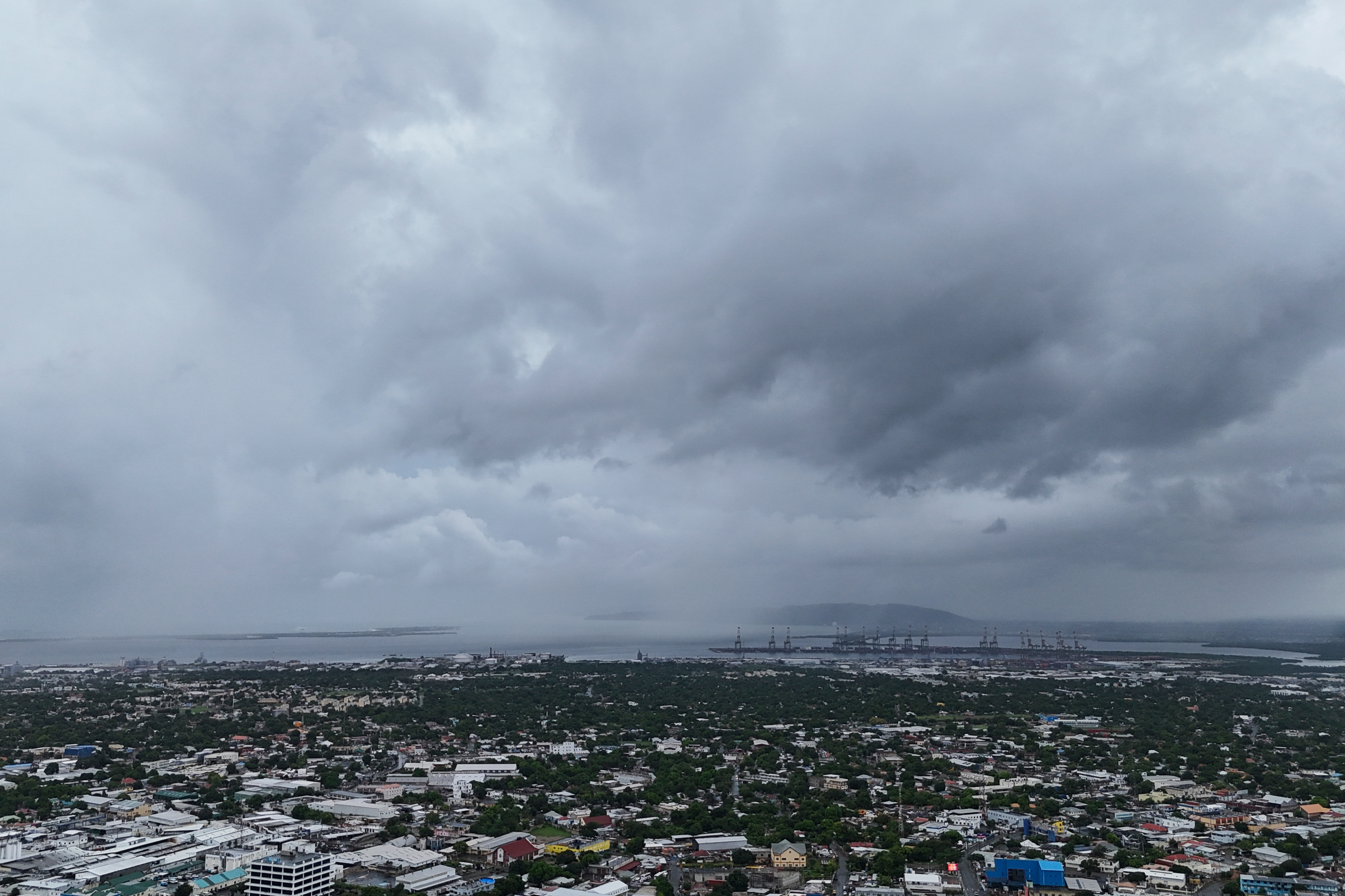 Clouds cover Kingston, Jamaica, ahead of the forecast arrival of Hurricane Melissa on Sunday, Oct. 26, 2025.
